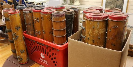 Twenty vintage printing cylinders